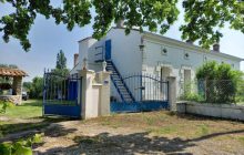 Detached stone house with garden