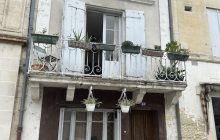 A three story town house with balcony, ideal lock up and leave