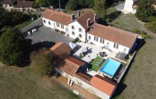 Fully renovated former school overlooking the lakes of the High Charente