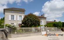 Character village house with great potential, featuring several outbuildings