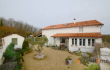 Located in the heart of Nieuil, this tastefully renovated traditional home blends rustic charm with modern comfort!!