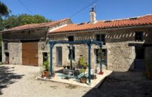 Charming Stone House with Successful Gîte Business, Barn & Enclosed Garden Near Mansle R7561